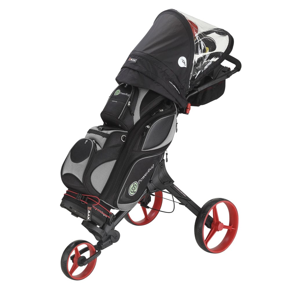Schwarze Big Max I-Dry Regenhülle über Golfwagen mit roten Rädern und durchsichtigen Abdeckungen.