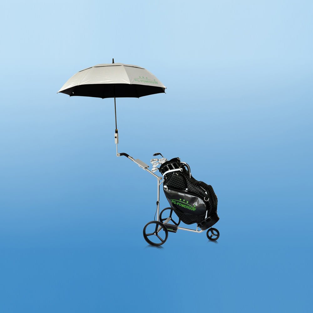 Beiger PG-Powergolf Regenschirm mit UV-Schutz auf Golftrolley mit schwarzem Golfbag.