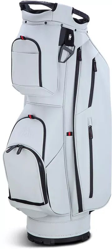 Weißes Big Max Dri Lite Prime Cartbag mit mehreren Reißverschlusstaschen und schwarzem Griffschaft.
