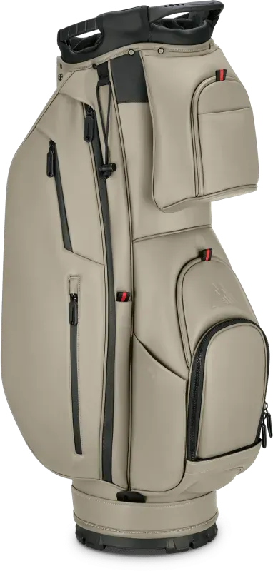 Taupefarbenes Big Max Dri Lite Prime Cartbag mit mehreren Reißverschlusstaschen und schwarzem Tragegriff.