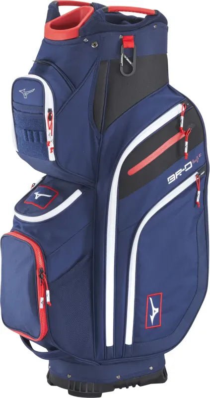 Navyblaues Mizuno Cartbag mit roten und weißen Akzenten, mehreren Taschen und Tragegriff.