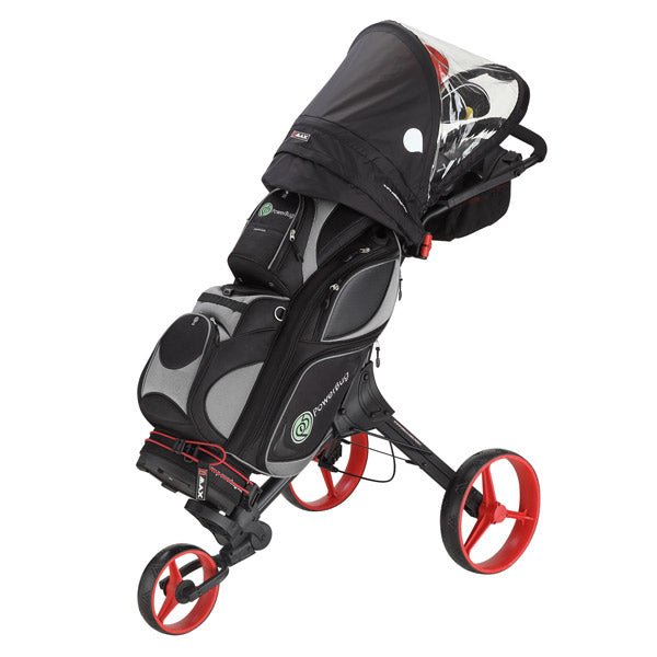Schwarze I-Dry Regenhaube auf dreirädrigem Golf-Trolley mit roten Rädern und integriertem Stauraum.