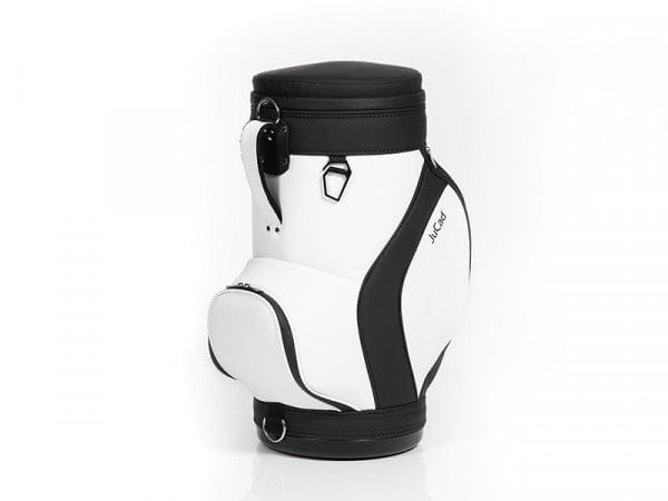 Weiß-schwarzer JuCad Sitzhocker mit integriertem Getränkekühler und gepolstertem Deckel.