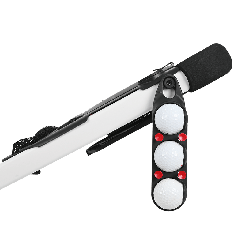 Schwarzer Quick Lok Ballhalter aus Kunststoff mit drei weißen Golfbällen und roten Fixierpunkten an einem weißen.