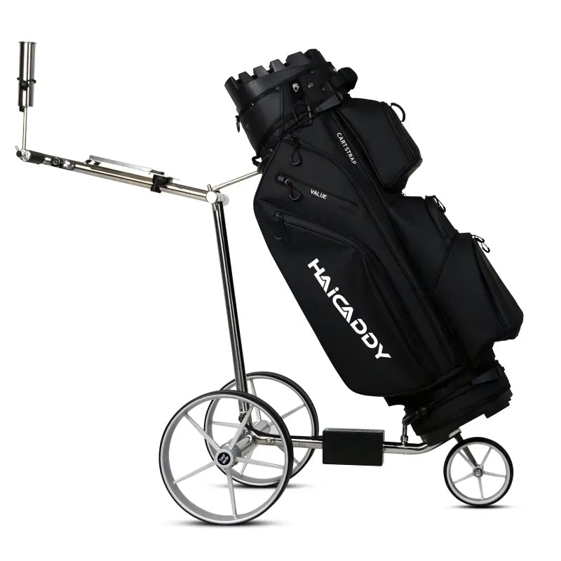 Silberner Haicaddy HC5 Elektrocaddy mit schwarzem Golfbag und drei Rädern.