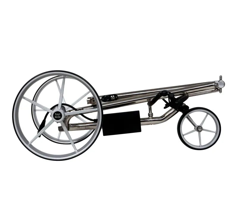 Kompakter gefalteter Haicaddy HC5 Elektrocaddy in Silber mit großen und kleinen Rädern.