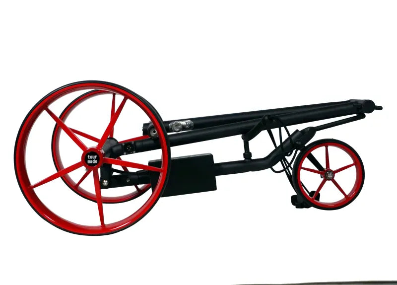 Schwarzer elektrischer Golftrolley mit schwarzen und roten Details, große Reifen, klappbar.