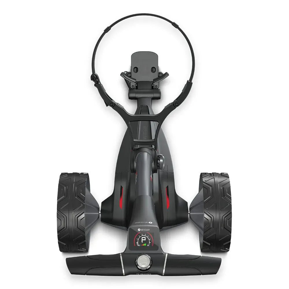 Schwarzer Motocaddy M1 DHC Ultra Lithium Elektro Golftrolley mit großem Griff und grobstolligen Reifen.