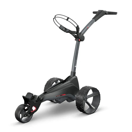 Black Motocaddy M1 DHC Ultra Lithium electric golf trolley with three tyres and ergonomic handle.